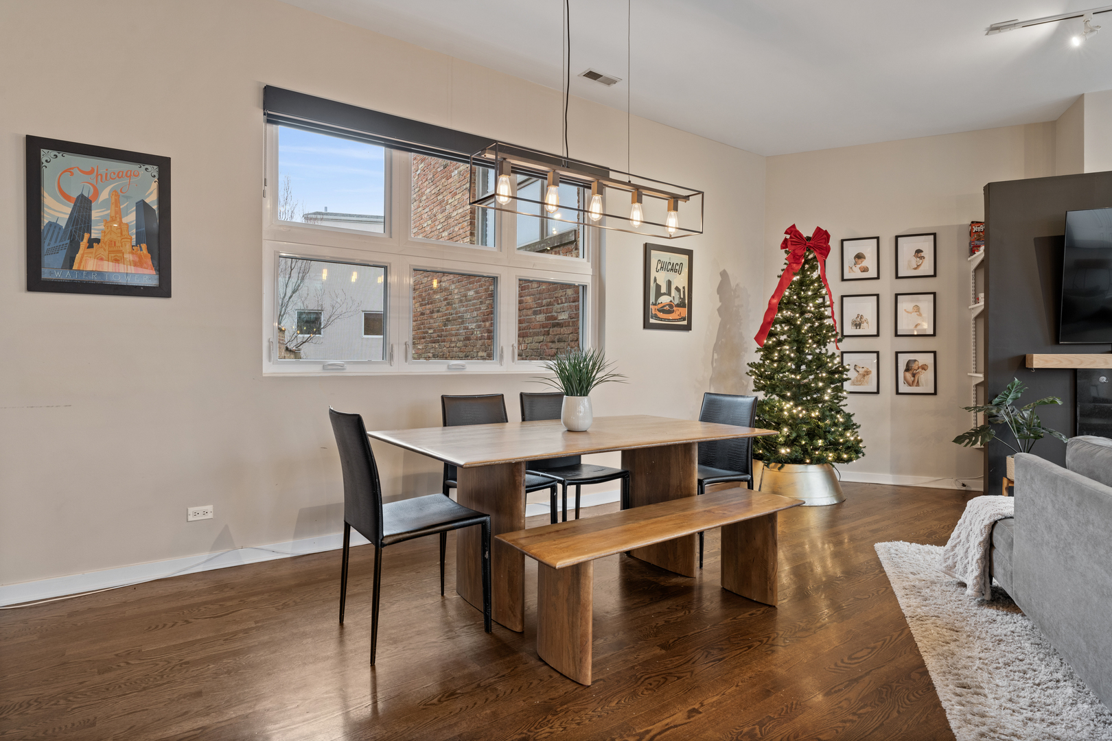 2828 North Talman Avenue, Unit R Chicago, IL 60618 - Photo 6 of 31 a living room with furniture a window and a flat screen tv