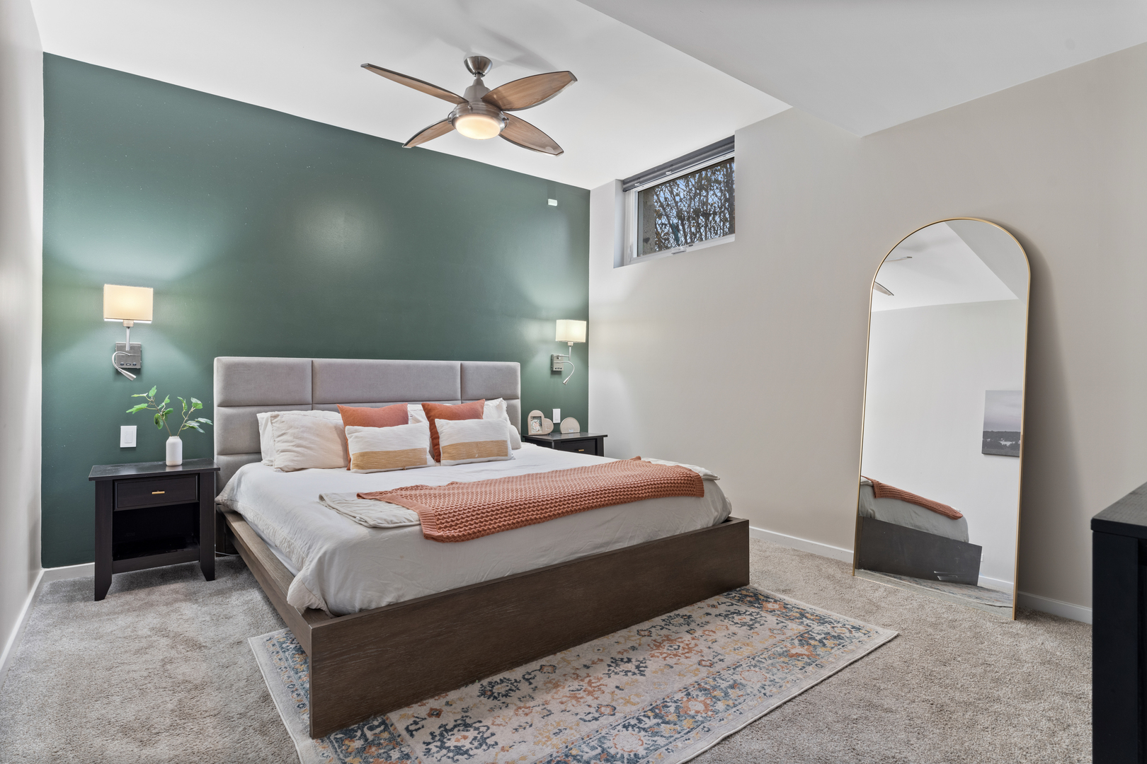 2828 North Talman Avenue, Unit R Chicago, IL 60618 - Photo 9 of 31 a bedroom with a large bed and a chandelier