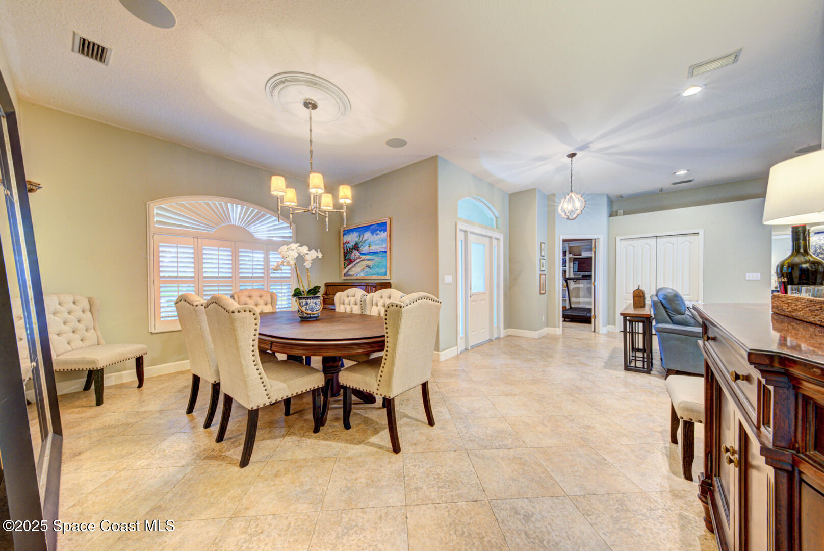 3950 Postridge Trail Melbourne, FL 32934 - Photo 22 of 63 Formal Dining Room and Front Foyer Combo