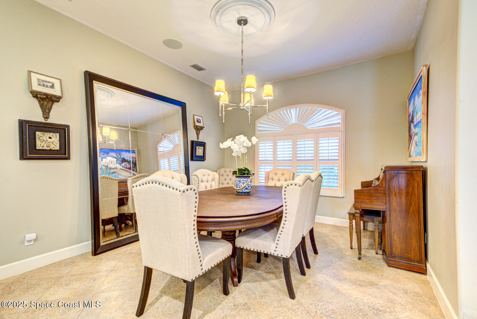 3950 Postridge Trail Melbourne, FL 32934 - Photo 23 of 63 Formal Dining Room with Generous Seating