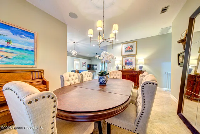 a view of a bathroom with a sink a mirror and a shower
