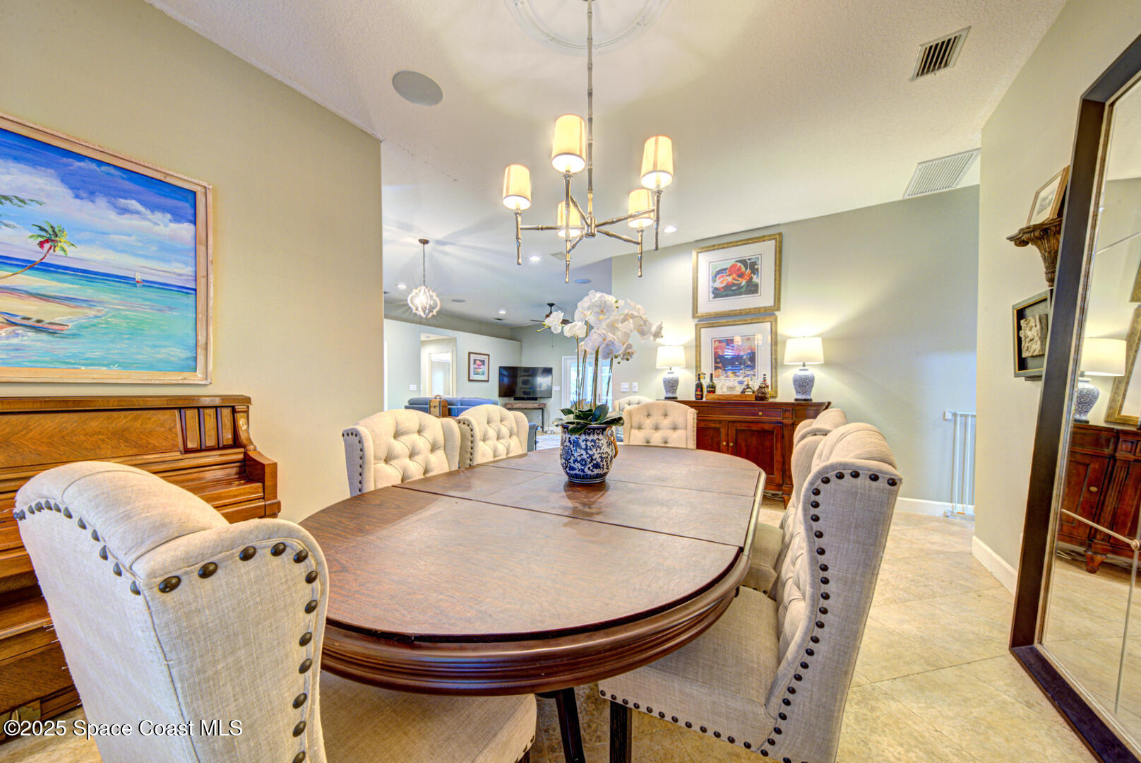 3950 Postridge Trail Melbourne, FL 32934 - Photo 24 of 63 Formal Dining Room with Generous Seating