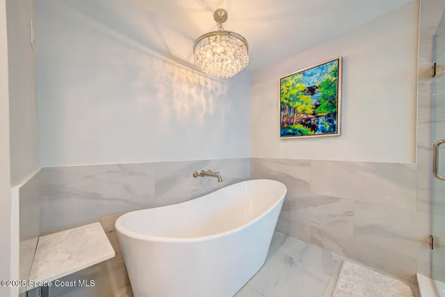 a bathroom with a sink vanity and mirror