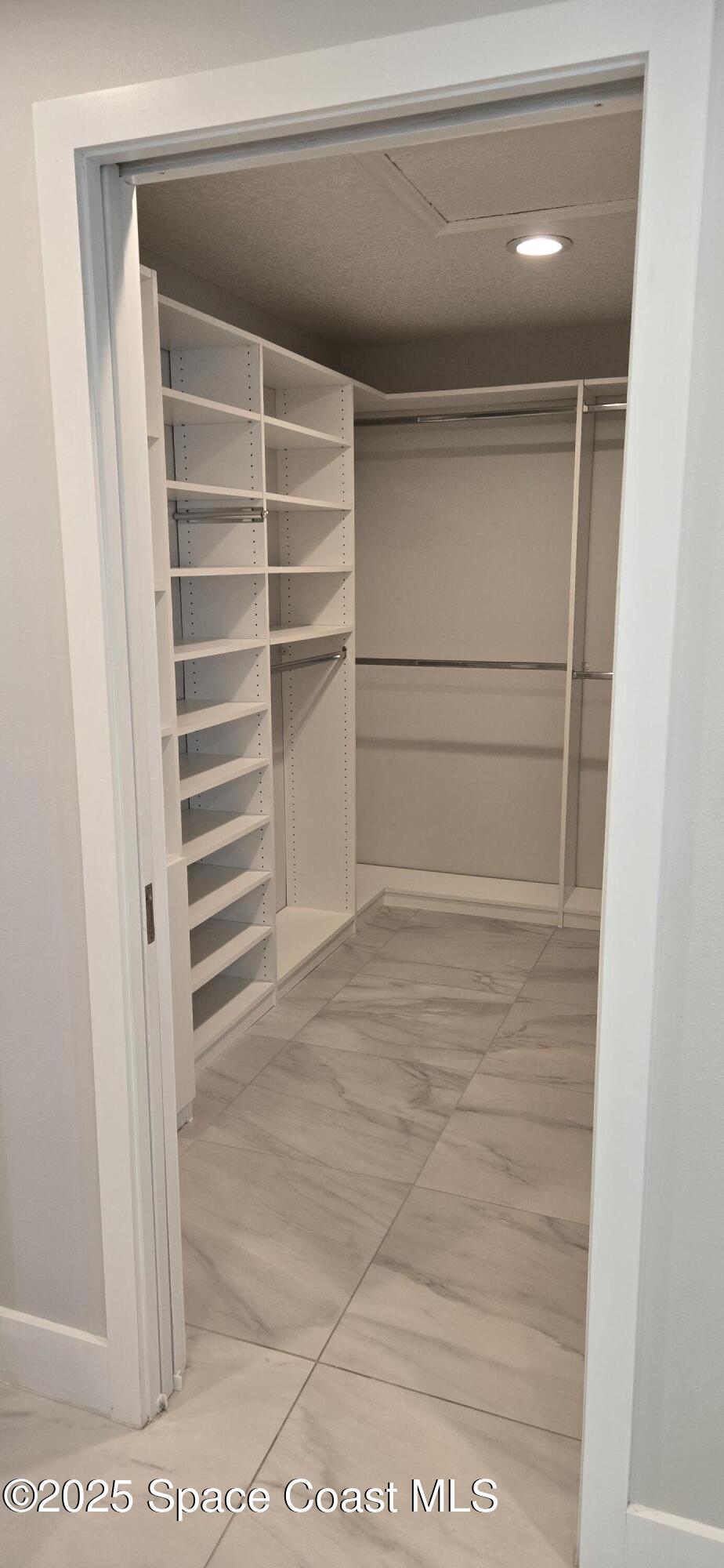 3950 Postridge Trail Melbourne, FL 32934 - Photo 32 of 63 Master Suite Walk In Closet Left Side