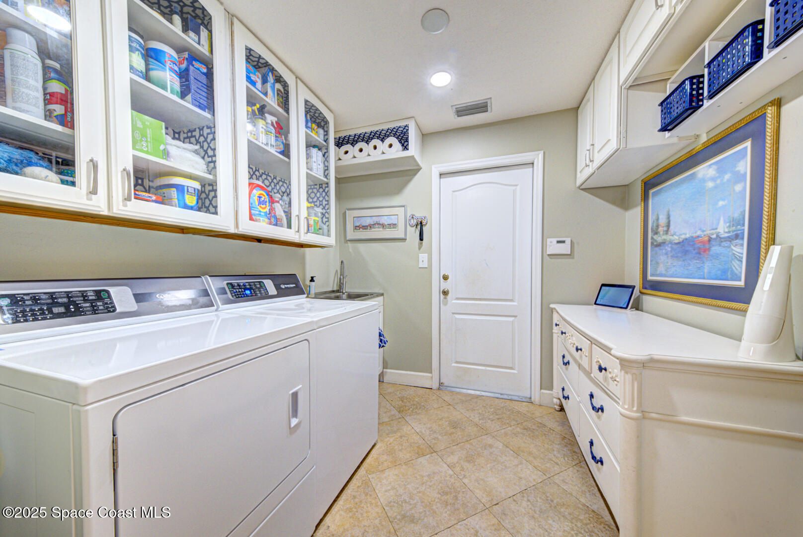 3950 Postridge Trail Melbourne, FL 32934 - Photo 37 of 63 Exquisite Remodeled Laundry Room