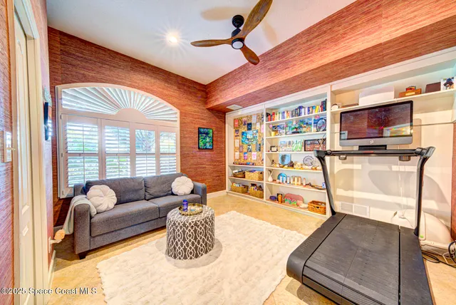 a view of a swimming pool with seating area