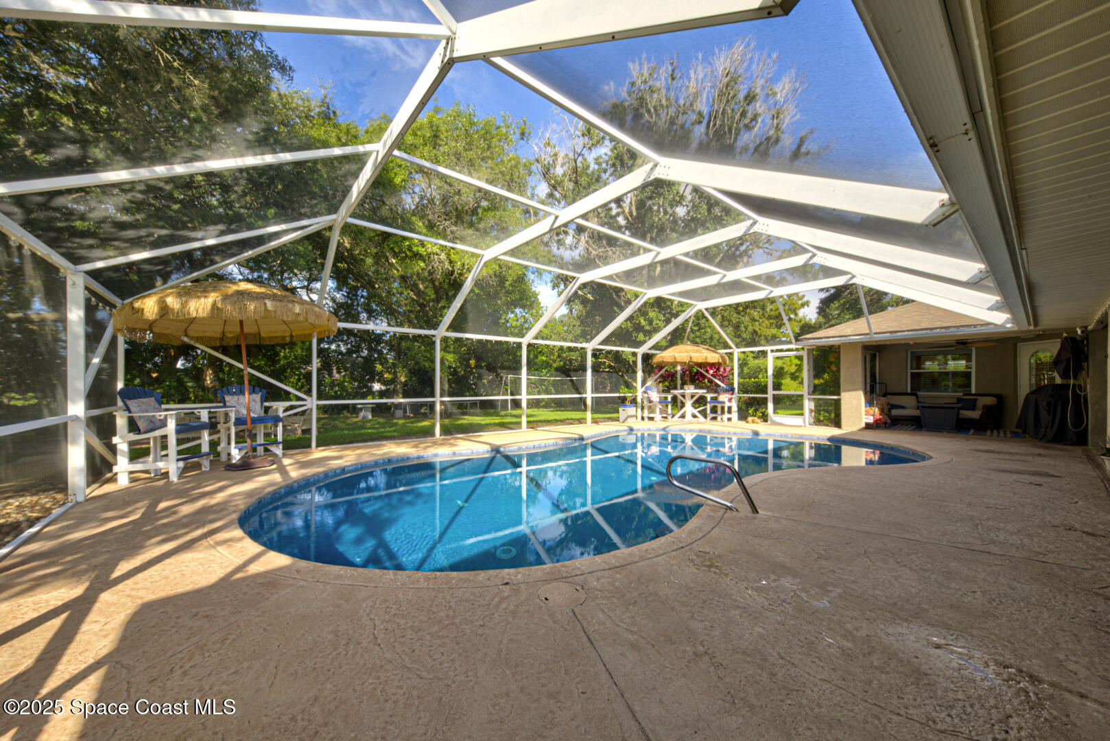 3950 Postridge Trail Melbourne, FL 32934 - Photo 46 of 63 Shimmering Salt Water Poolt Pool Pic 3