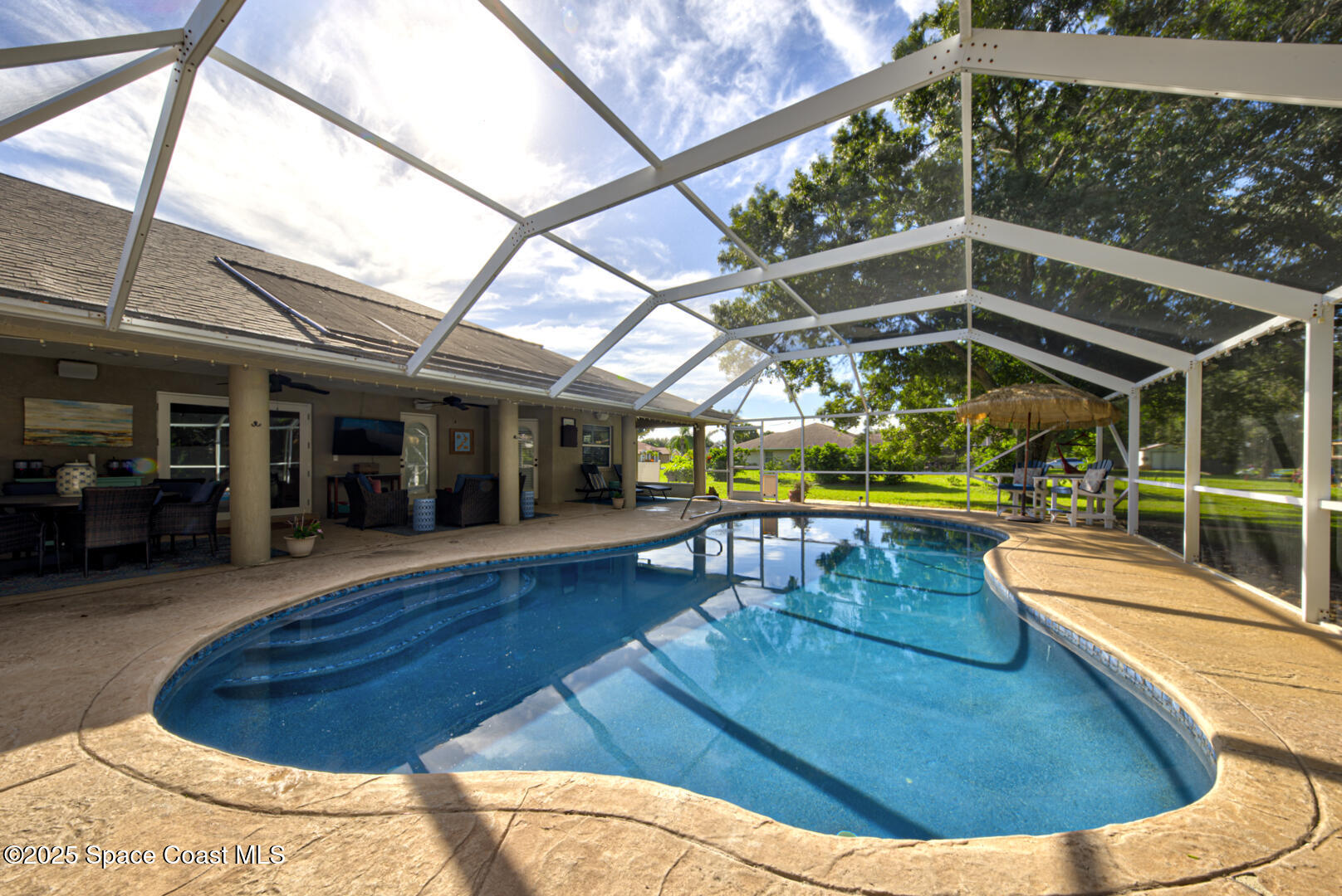3950 Postridge Trail Melbourne, FL 32934 - Photo 47 of 63 Shimmering Salt Water Pool Pic 4