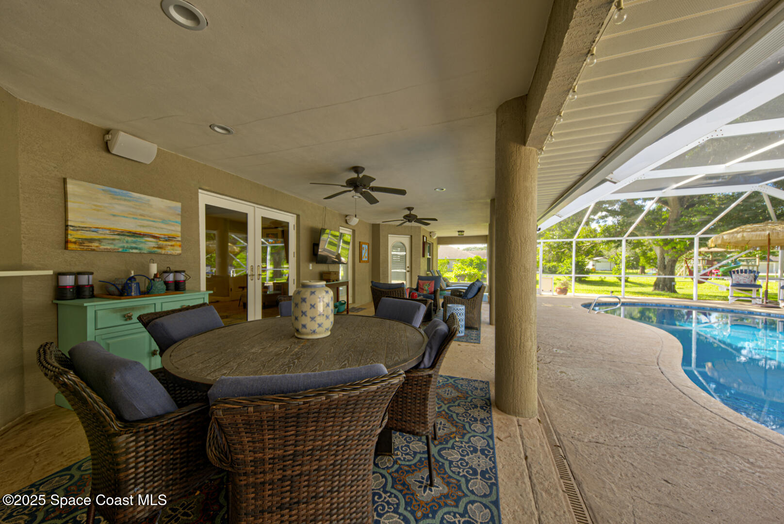 3950 Postridge Trail Melbourne, FL 32934 - Photo 48 of 63 Lanai & Shimmering salt water pool