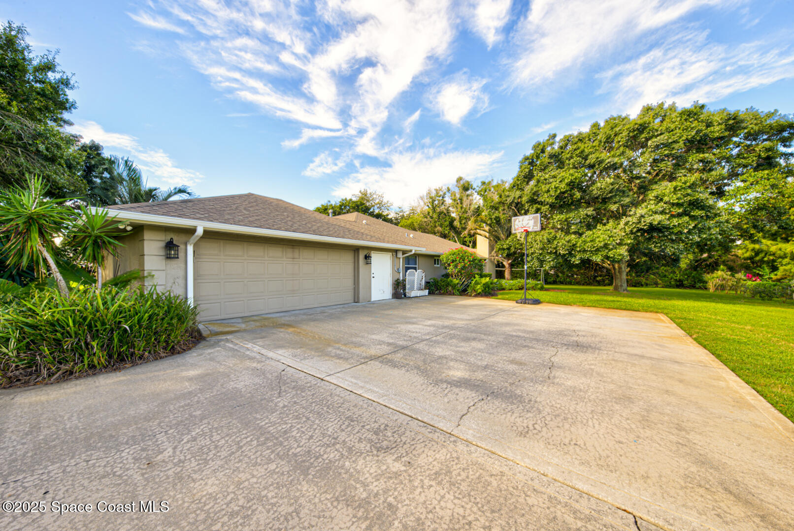 3950 Postridge Trail Melbourne, FL 32934 - Photo 55 of 63 Attractive Side Entry Garage with Court