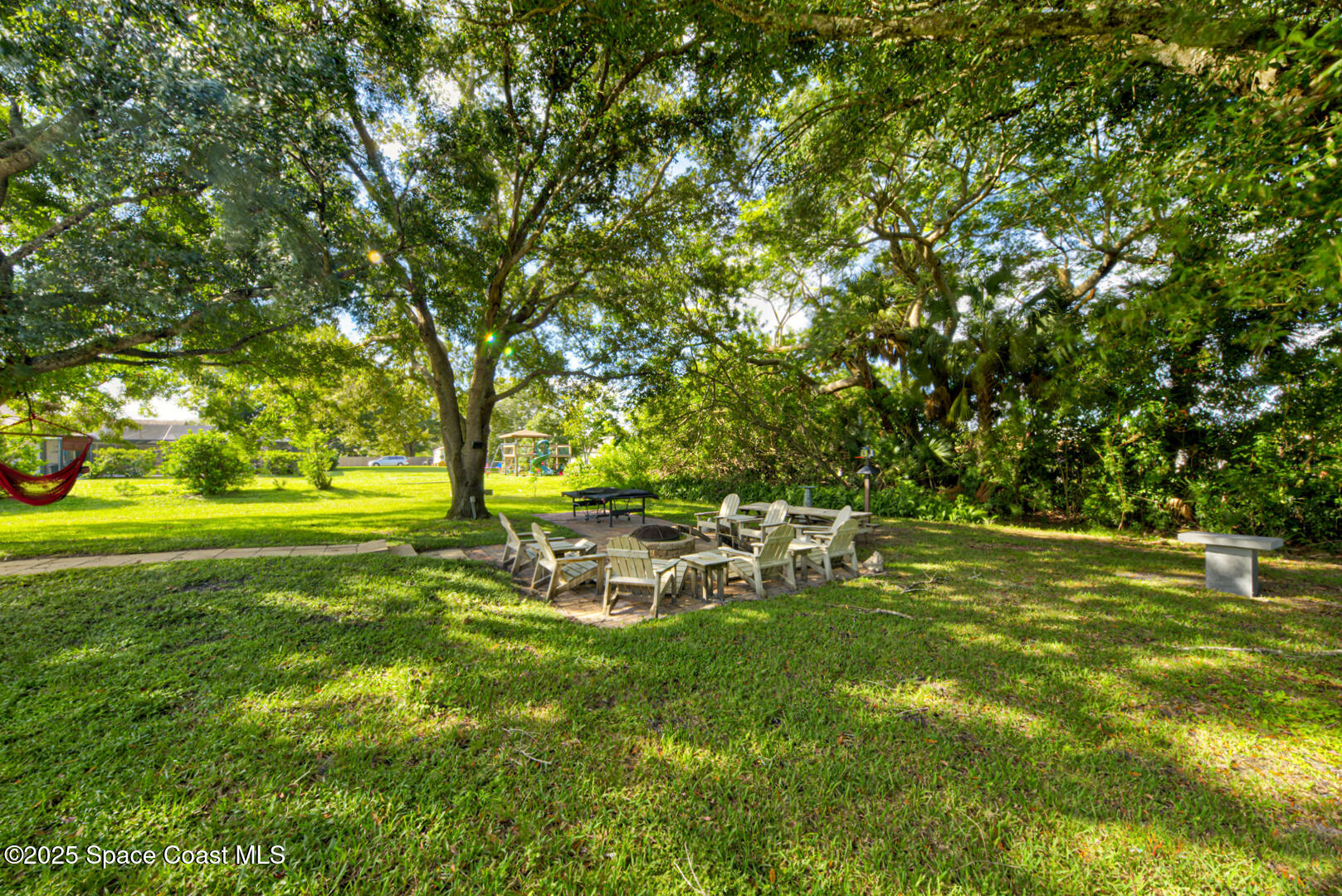 3950 Postridge Trail Melbourne, FL 32934 - Photo 59 of 63 Fire Pit Area View 1