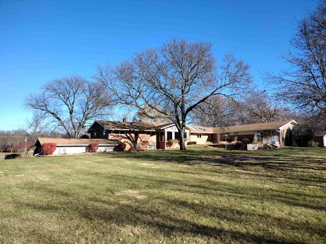 a view of a swimming pool with an outdoor space