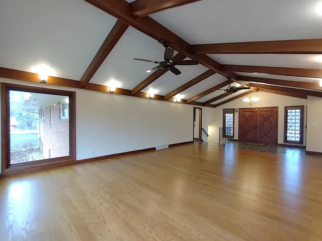 a view of a kitchen and a stove top oven