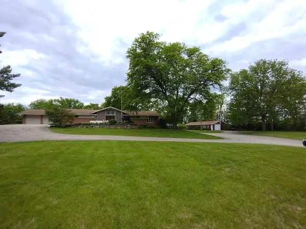 a view of outdoor space with garden area