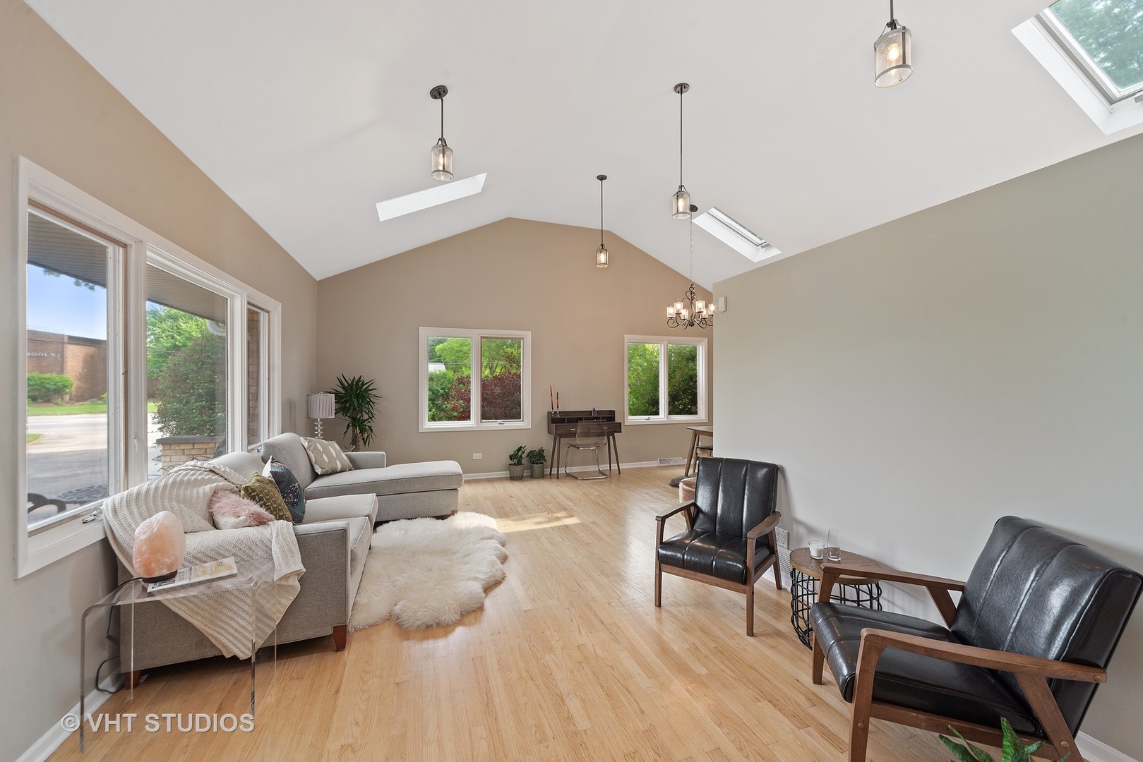 197 West Butterfield Road Elmhurst, IL 60126 - Photo 2 of 15 a living room with furniture and a large window