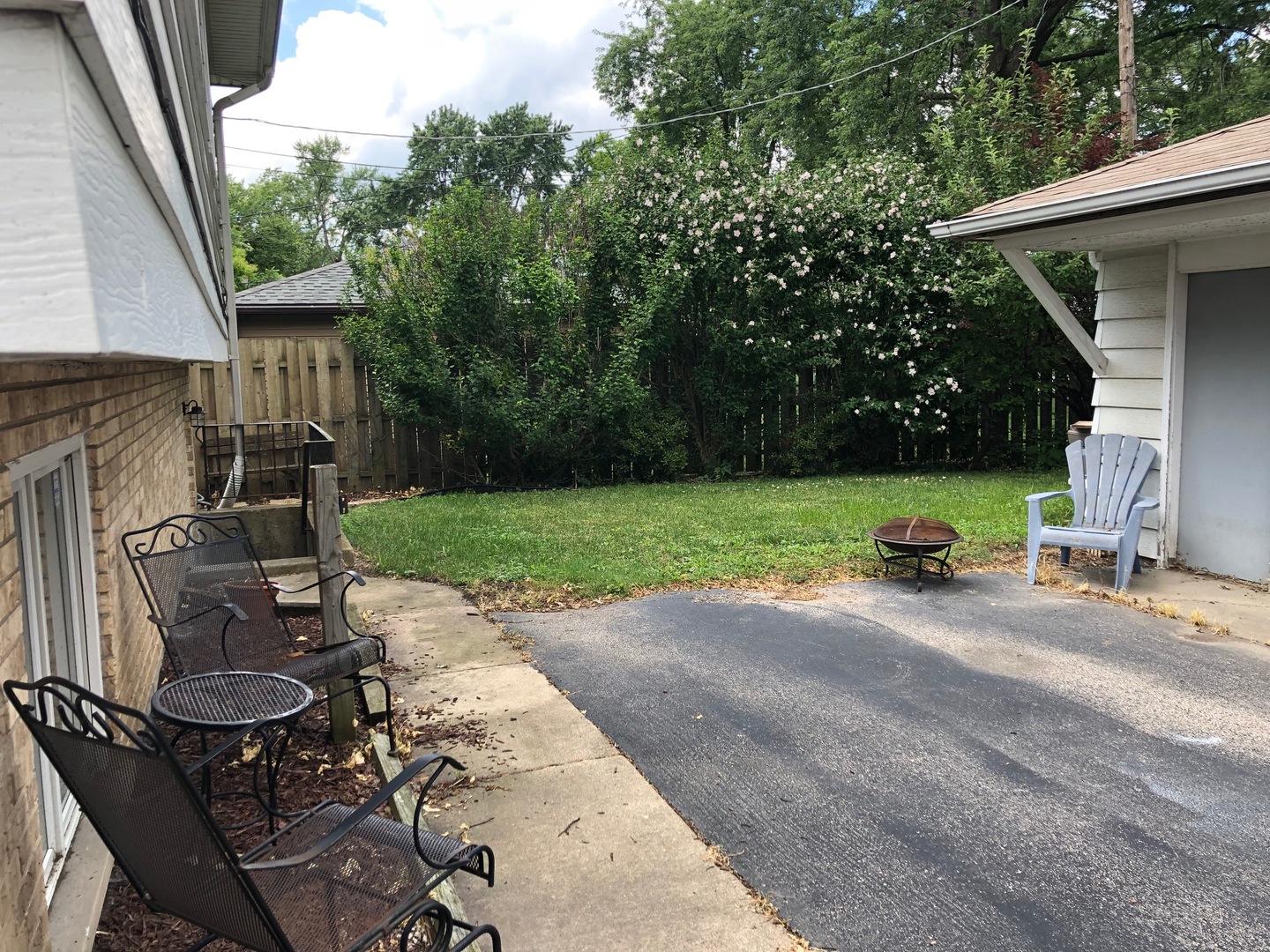 197 West Butterfield Road Elmhurst, IL 60126 - Photo 14 of 15 a view of backyard with outdoor seating and green space