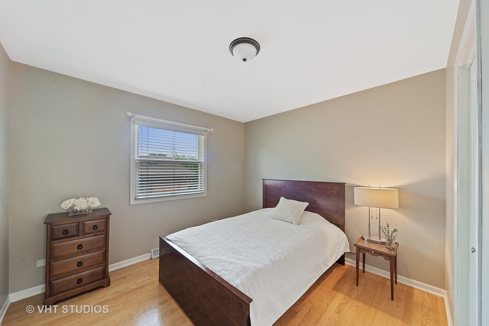 197 West Butterfield Road Elmhurst, IL 60126 - Photo 9 of 15 a bedroom with a bed and a closet