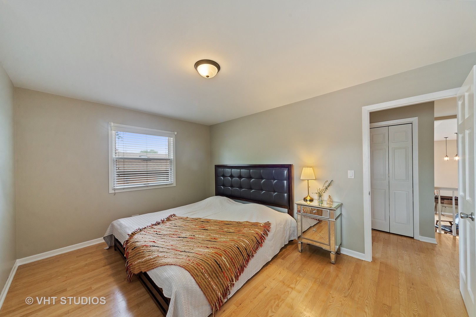 197 West Butterfield Road Elmhurst, IL 60126 - Photo 10 of 15 a bedroom with a bed and a window