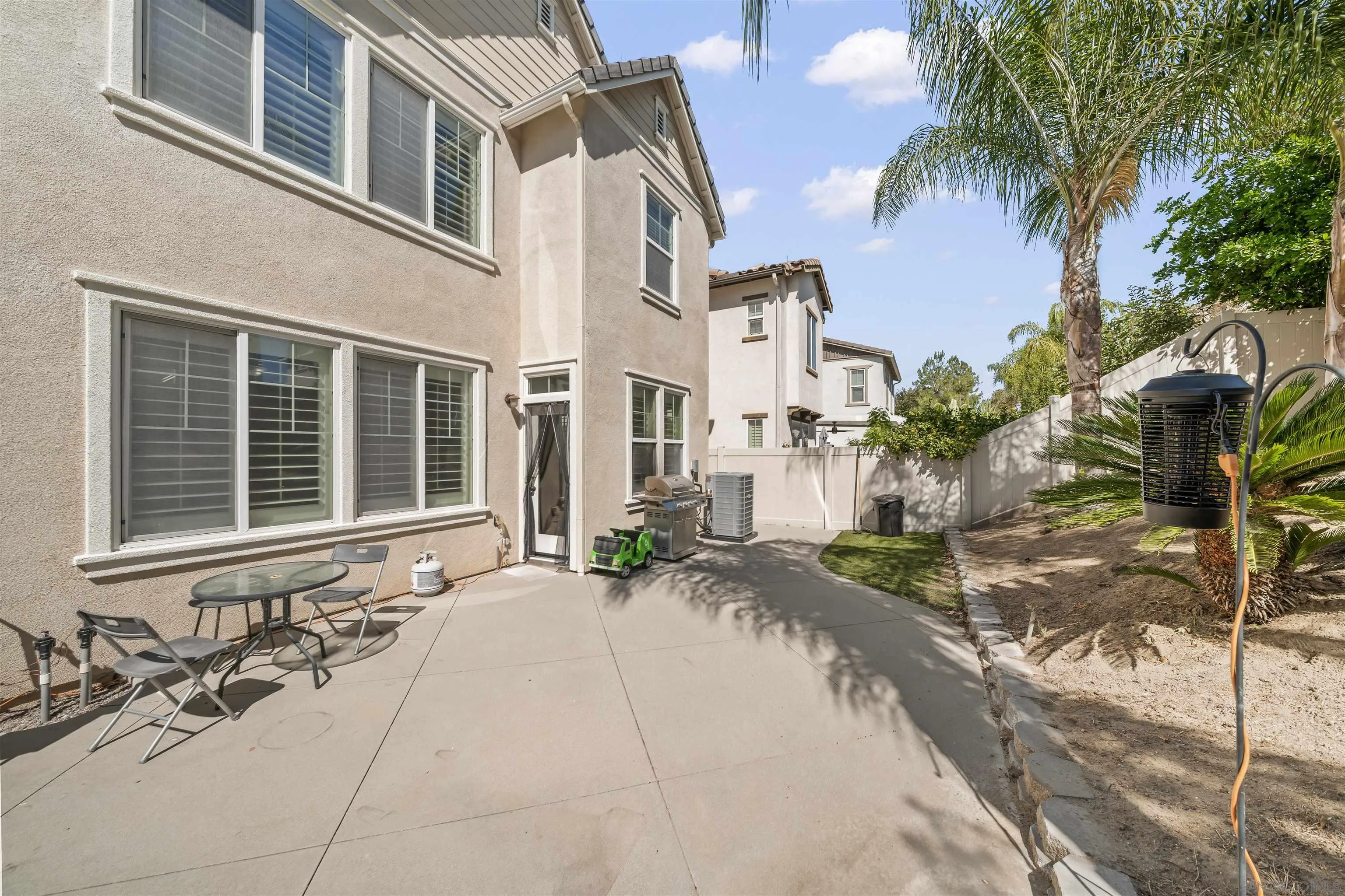 31937 Red Pine Way, Unit 80 Temecula, CA 92592 - Photo 1 of 1 a front view of a house with a yard