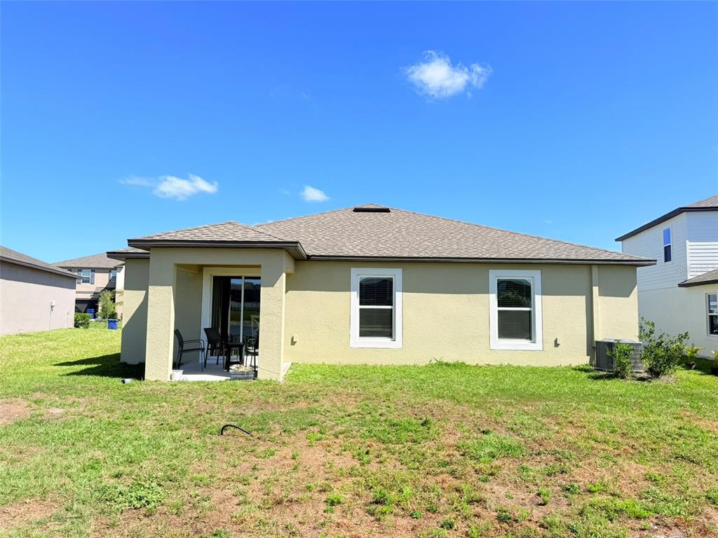 11244 Linden Depot Road San Antonio, FL 33576 - Photo 40 of 41 a front view of house with yard and trees