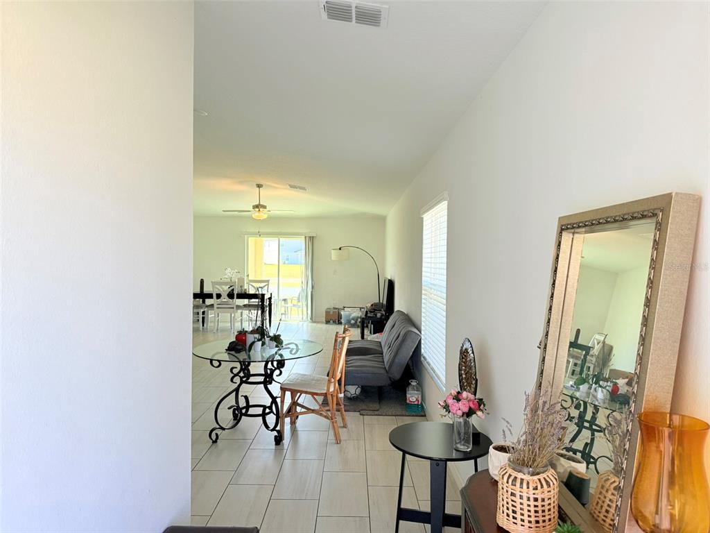 11244 Linden Depot Road San Antonio, FL 33576 - Photo 6 of 41 a view of a livingroom with furniture and a window