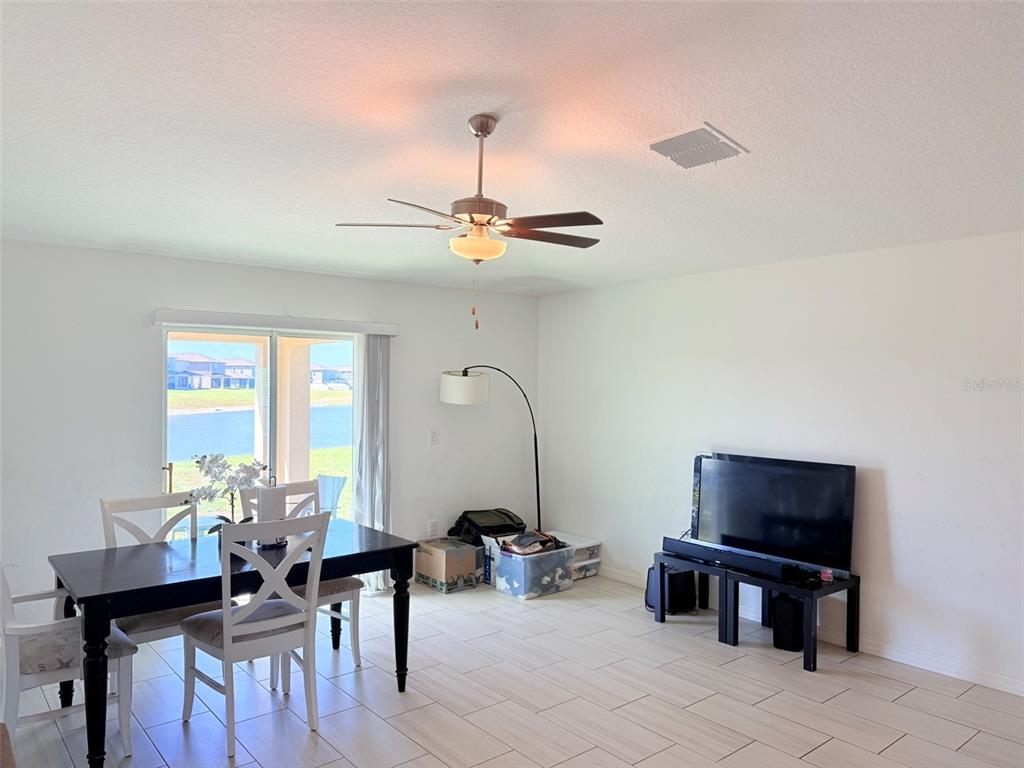 11244 Linden Depot Road San Antonio, FL 33576 - Photo 9 of 41 a view of a livingroom with furniture and window