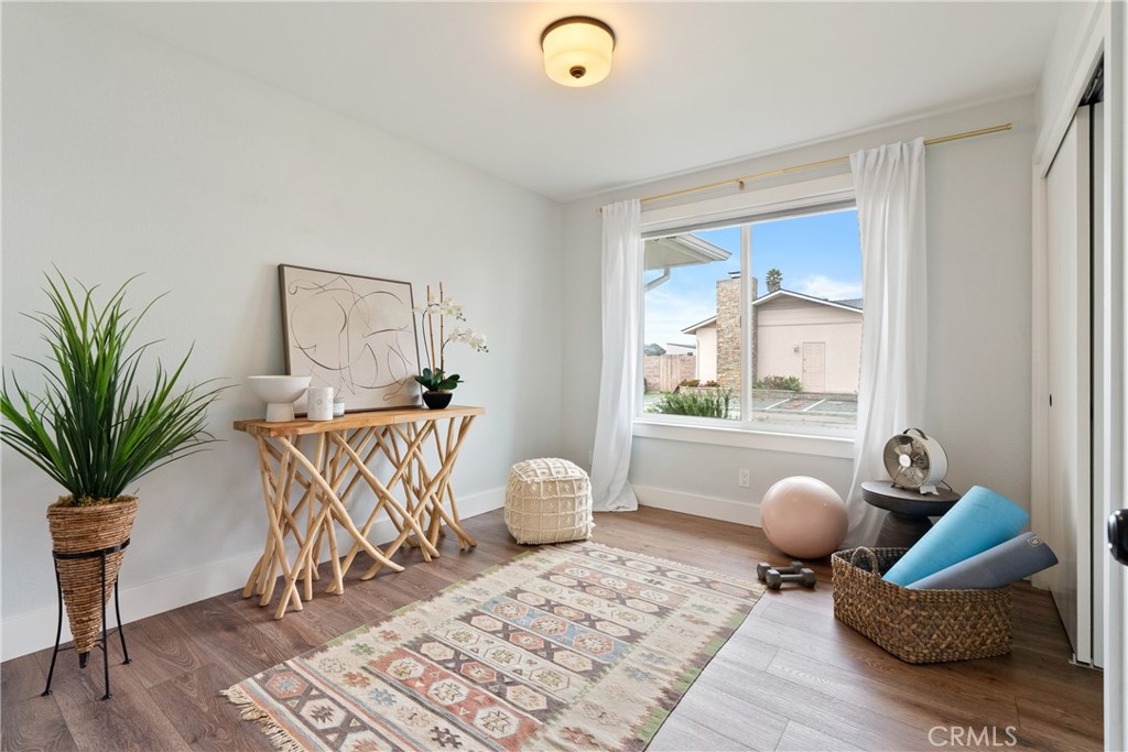 190 Verdon Street Morro Bay, CA 93442 - Photo 12 of 27 a bedroom with furniture and wooden floor