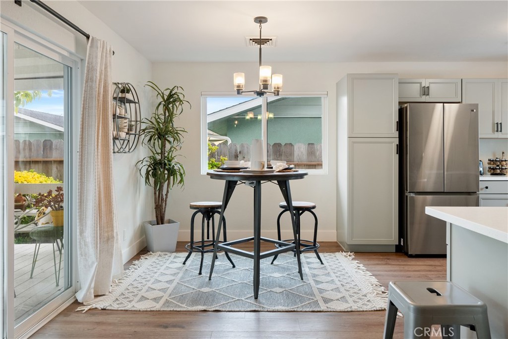 190 Verdon Street Morro Bay, CA 93442 - Photo 9 of 27 a view of a dining room with furniture and a chandelier