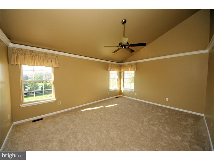 71 Amberfield Road Robbinsville, NJ 08691 - Photo 14 of 25 a view of an empty room with a window