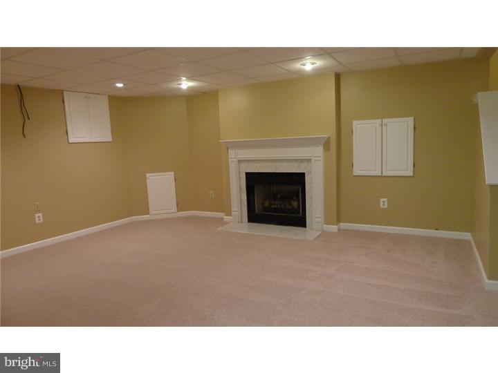 71 Amberfield Road Robbinsville, NJ 08691 - Photo 20 of 25 a open hall with a fireplace