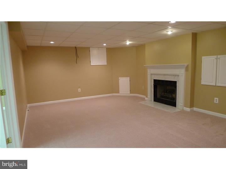71 Amberfield Road Robbinsville, NJ 08691 - Photo 21 of 25 a open hall with a fireplace