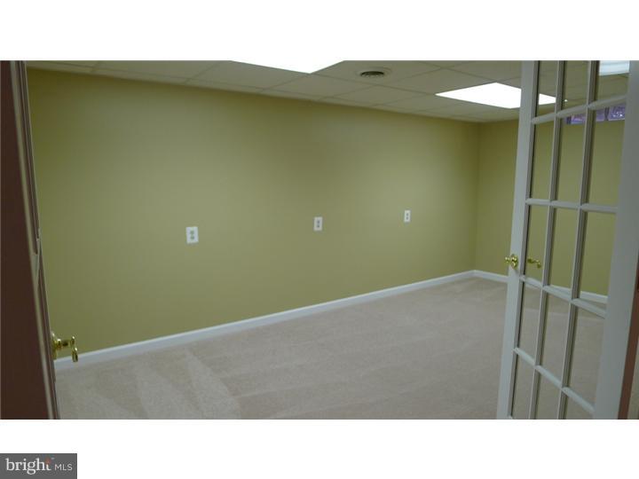 71 Amberfield Road Robbinsville, NJ 08691 - Photo 22 of 25 a open area with wooden floor