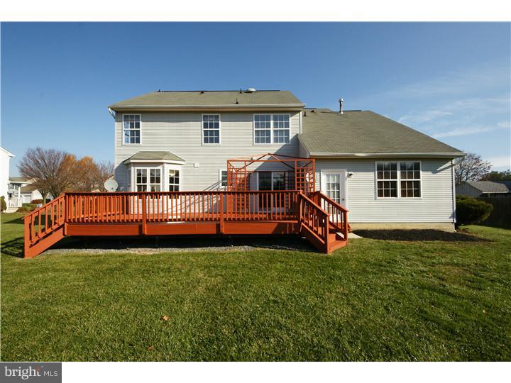 71 Amberfield Road Robbinsville, NJ 08691 - Photo 23 of 25 a view of a house with backyard and porch