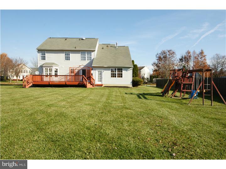 71 Amberfield Road Robbinsville, NJ 08691 - Photo 24 of 25 a front view of a house with garden