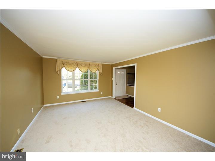 71 Amberfield Road Robbinsville, NJ 08691 - Photo 4 of 25 a view of an empty room with a window