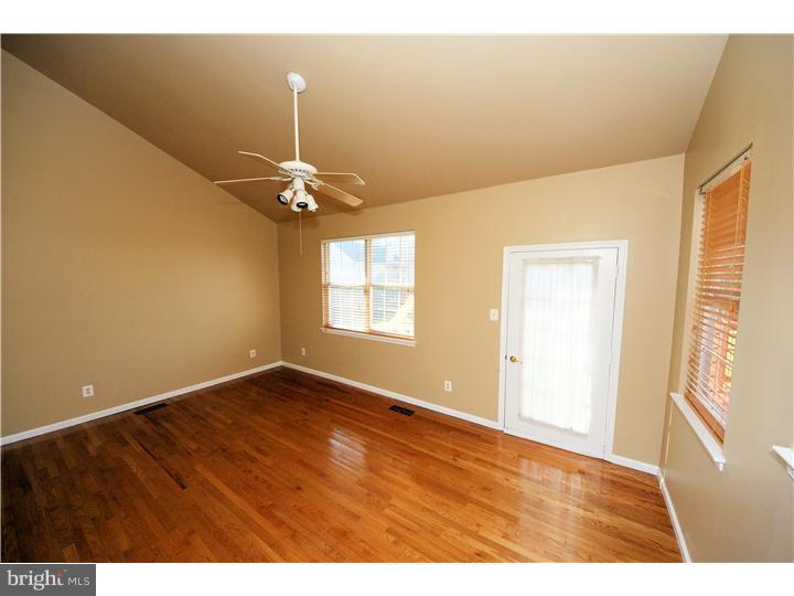 71 Amberfield Road Robbinsville, NJ 08691 - Photo 10 of 25 a view of an empty room with a window
