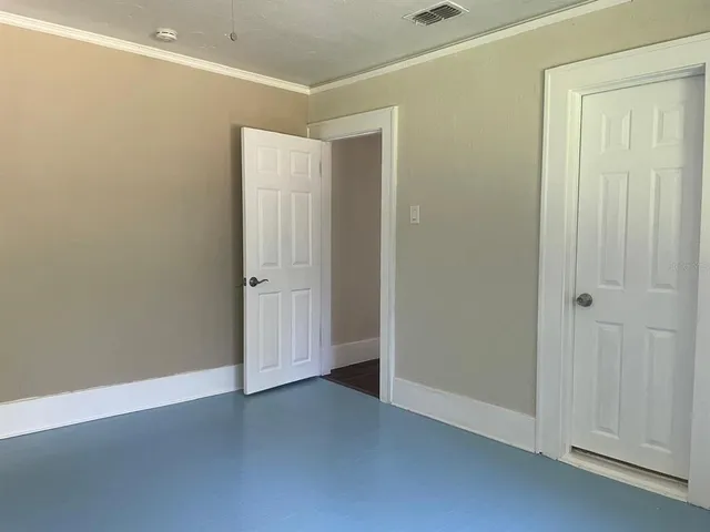 an empty room with windows