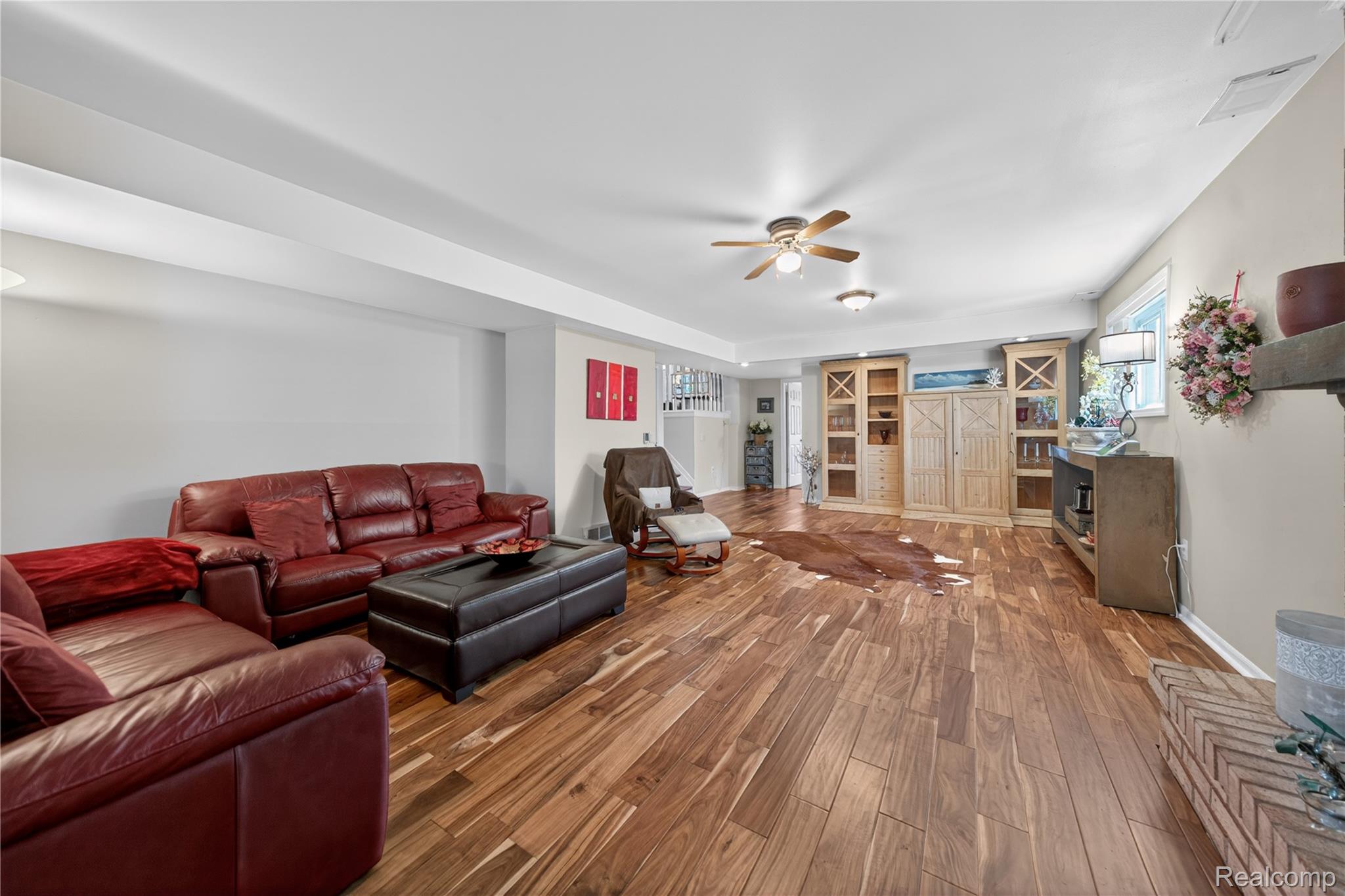 309 Antoinette Drive Rochester, MI 48309 - Photo 15 of 36 Family Room with heated floor for winter comfort.
