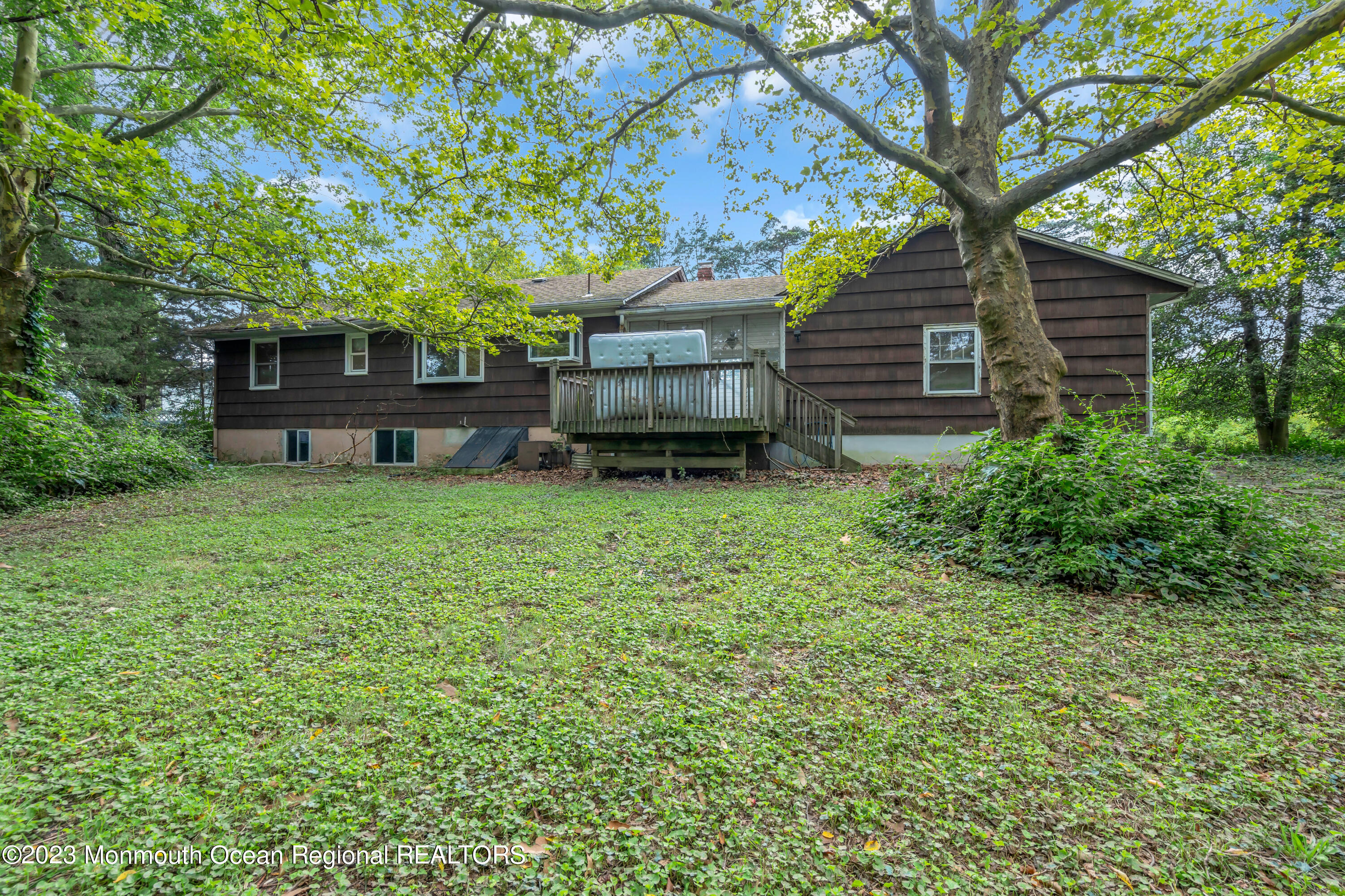 70 Middlesex Road Matawan, NJ 07747 - Photo 54 of 58 a house that has a tree in front of it