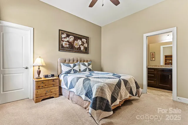 a bedroom with a bed and a cabinets