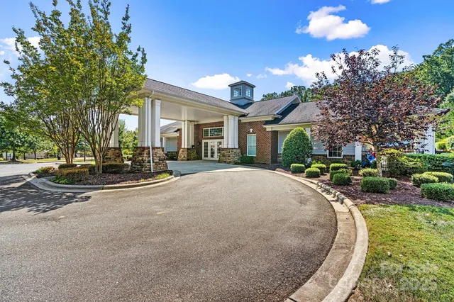 a view of a house with a swimming pool