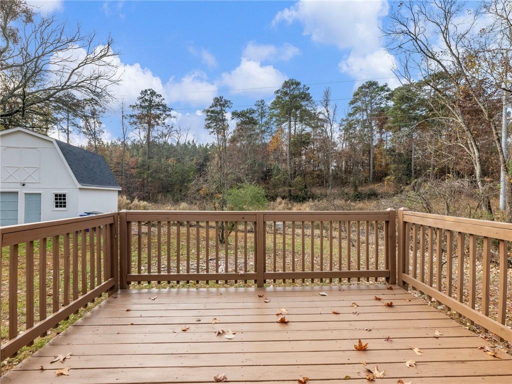 930 Woodbridge Drive Northeast Conyers, GA 30012 - Photo 33 of 38 a view of balcony with wooden floor and fence