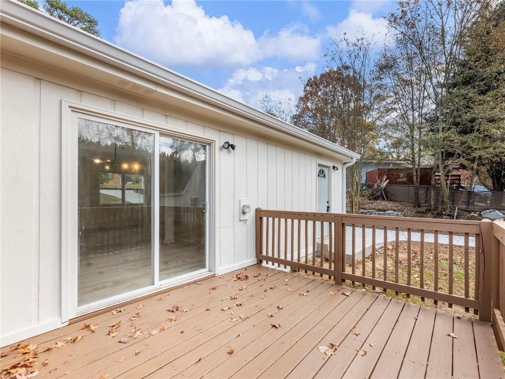 930 Woodbridge Drive Northeast Conyers, GA 30012 - Photo 34 of 38 a view of backyard with a deck