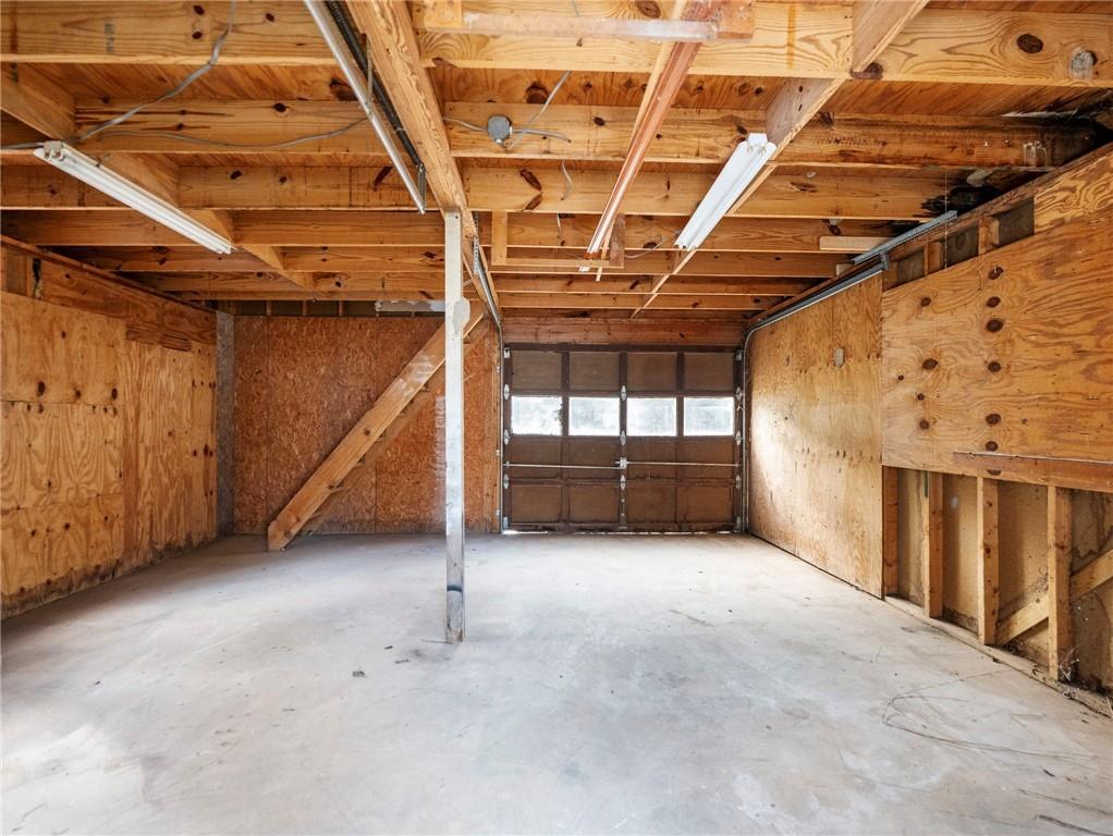 930 Woodbridge Drive Northeast Conyers, GA 30012 - Photo 4 of 38 a view of an empty room with a staircase