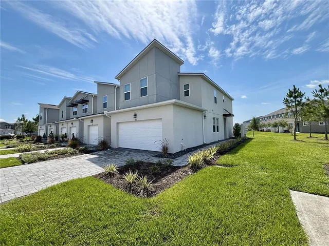 a view of a back yard of the house