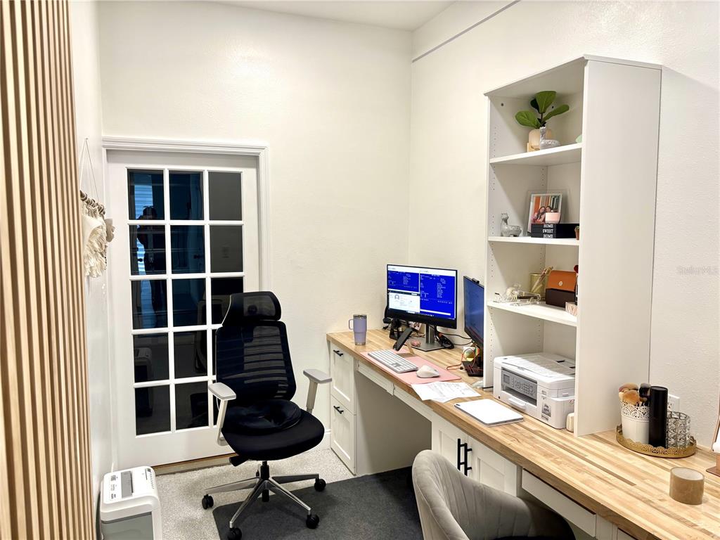 921 Spring Palms Loop Orlando, FL 32828 - Photo 22 of 43 a workspace with furniture and window