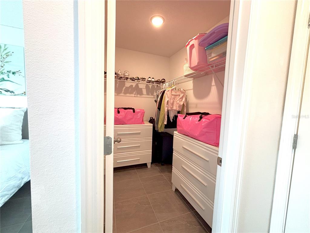 921 Spring Palms Loop Orlando, FL 32828 - Photo 28 of 43 a utility room with dryer and washer