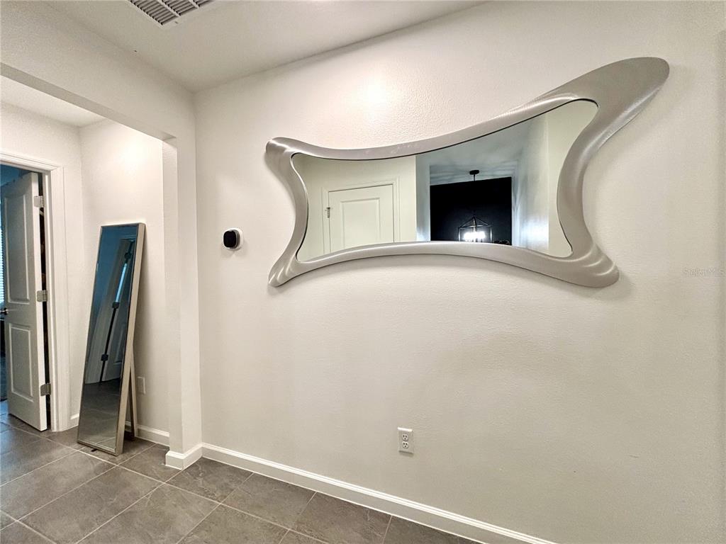 921 Spring Palms Loop Orlando, FL 32828 - Photo 30 of 43 a view of a livingroom with a staircase