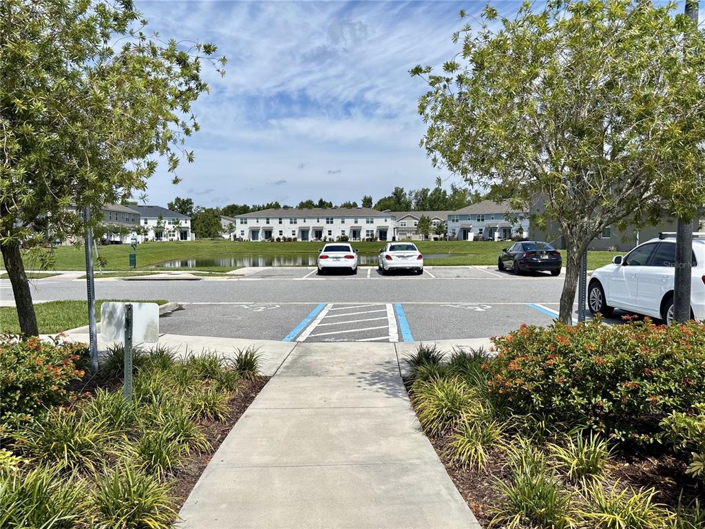 921 Spring Palms Loop Orlando, FL 32828 - Photo 35 of 43 a view of a street with houses on both side
