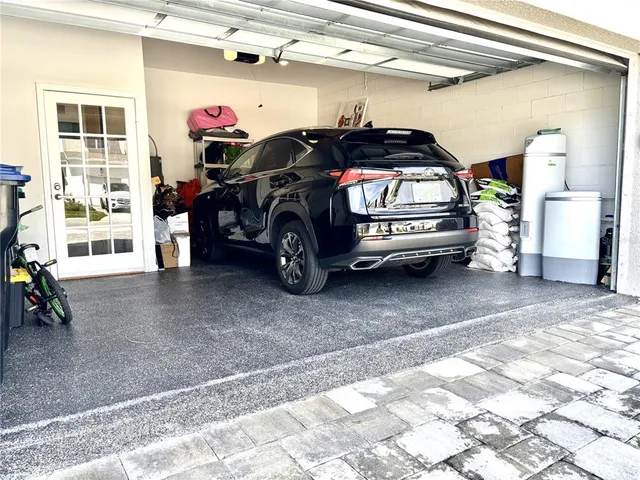 a view of a garage with parked cars